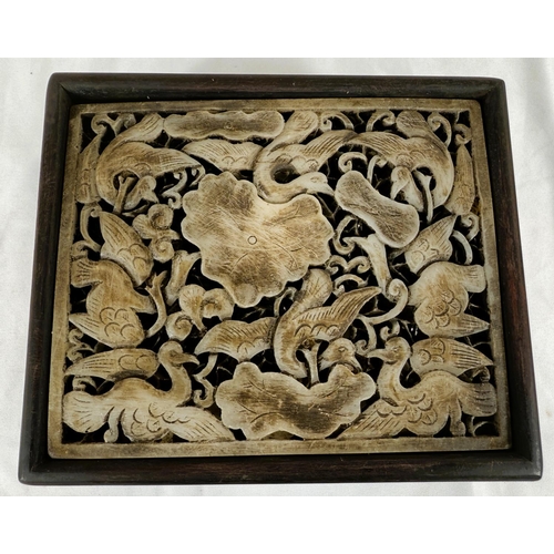 458B - A Chinese hardwood box with a pierced stone carving to the lid with birds and leaves. 16 1/2 x 14 x ... 