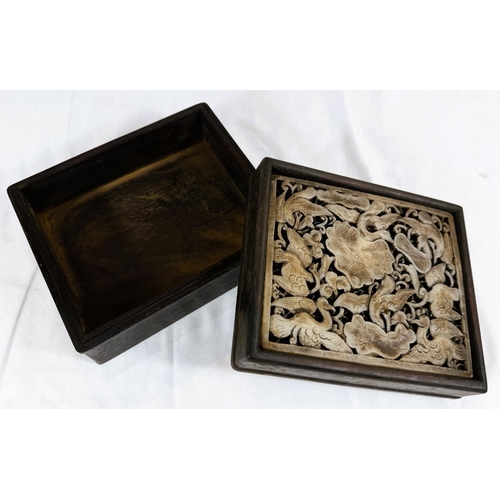 458B - A Chinese hardwood box with a pierced stone carving to the lid with birds and leaves. 16 1/2 x 14 x ... 