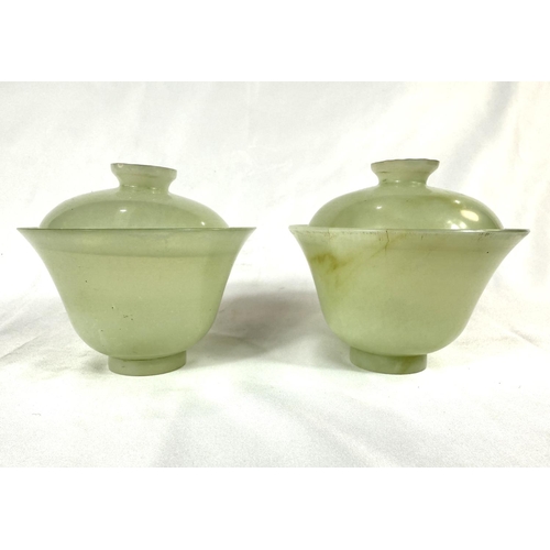 459A - A pair of Chinese jade coloured stone cups with covers, height 6cm.