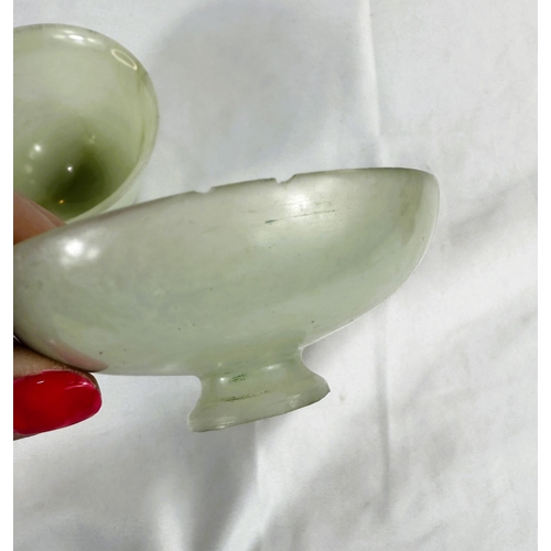 459A - A pair of Chinese jade coloured stone cups with covers, height 6cm.