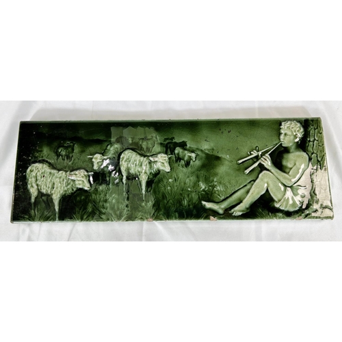 464A - A 19th Century Minton's style green glaze tile of Shepherd playing instrument for sheep 15 x 46cm