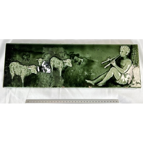 464A - A 19th Century Minton's style green glaze tile of Shepherd playing instrument for sheep 15 x 46cm