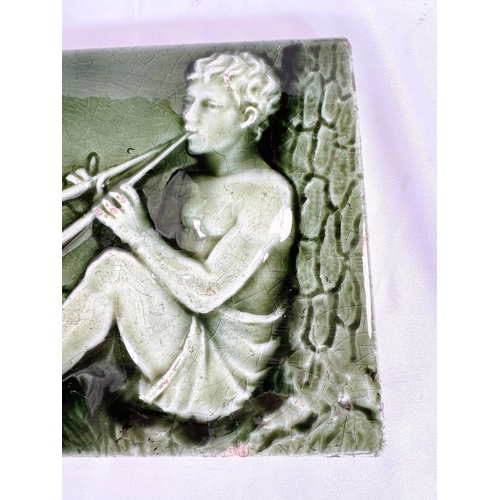 464A - A 19th Century Minton's style green glaze tile of Shepherd playing instrument for sheep 15 x 46cm