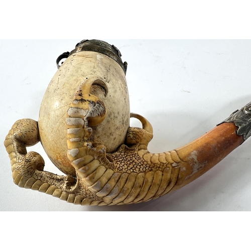 48 - A large cased amber and Meerschaum pipe with egg and claw bowl and white metal mounts, length 22cm.