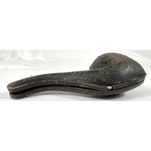 49 - A cased amber and Meerschaum pipe in the form of a skull with chased silver mounts, length 20cm.