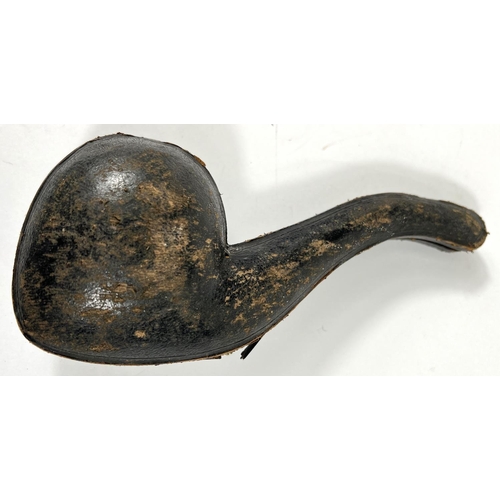 49 - A cased amber and Meerschaum pipe in the form of a skull with chased silver mounts, length 20cm.