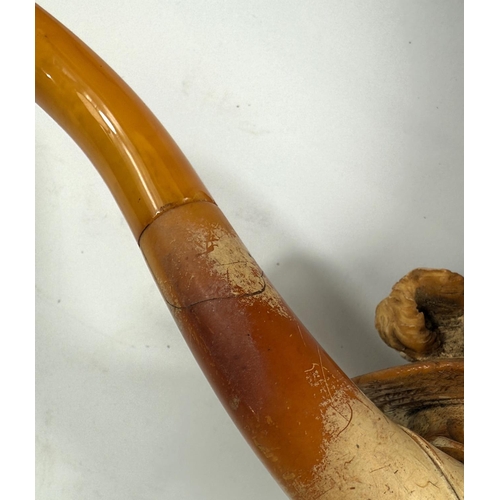 50 - A large cased amber and Meerschaum pipe depicting a bearded man's head with feathered hat (stem slig... 