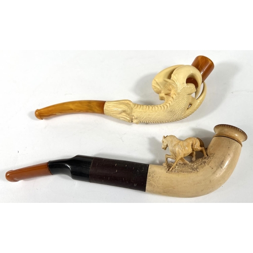 53 - 3 cased amber and Meerschaum pipes depicting a horse, a large claw and a ladies head (broken stem)