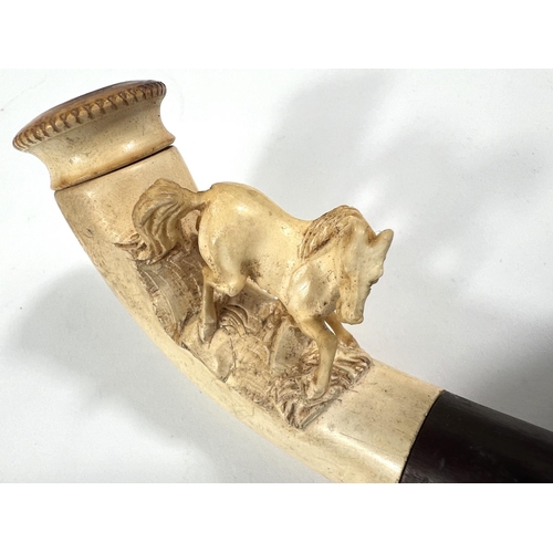 53 - 3 cased amber and Meerschaum pipes depicting a horse, a large claw and a ladies head (broken stem)