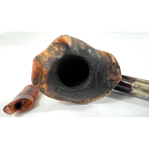 53 - 3 cased amber and Meerschaum pipes depicting a horse, a large claw and a ladies head (broken stem)