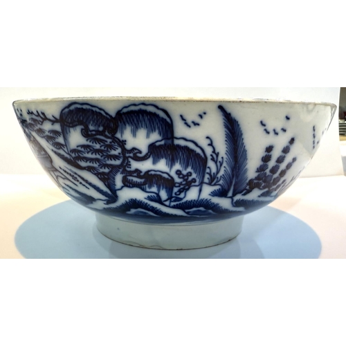 537 - LIVERPOOL PEARLWARE, an 18th century punch bowl with typical underglaze blue decoration, 26cm dia.