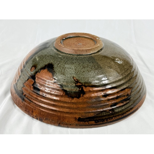 539 - ALAN WARD, studio pottery, a large stoneware bowl, signed in full, 32cm diameter.