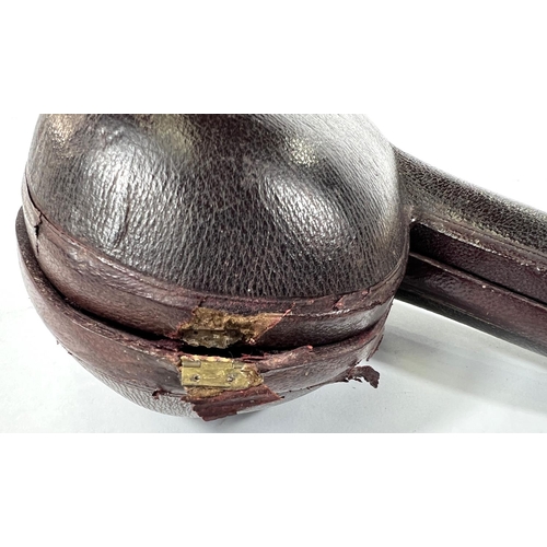 55 - A large cased amber and Meerschaum pipe depicting the head and shoulders of Napoleon.