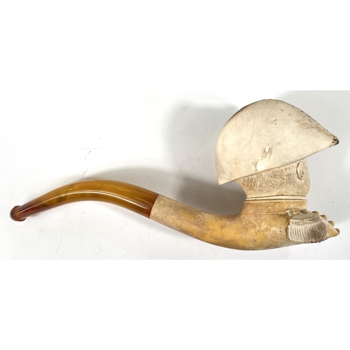 55 - A large cased amber and Meerschaum pipe depicting the head and shoulders of Napoleon.