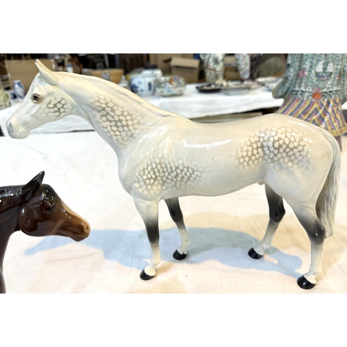 568 - BESWICK, a group of 3 dappled horses, 31cm, 28cm and 20cm; another horse