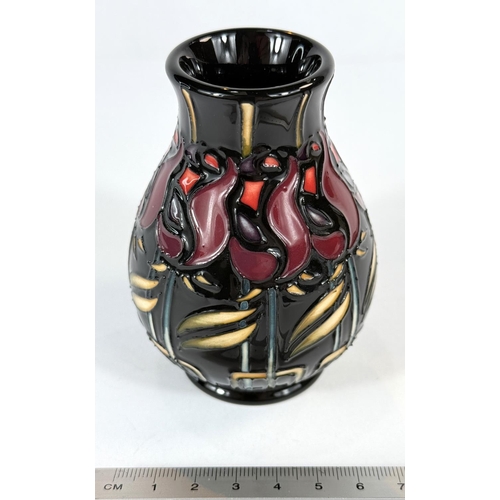 576 - A Moorcroft small baluster vase Night Rose designed by Nicola Slaney, with stamps dates and signatur... 