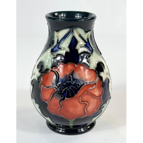 577 - A Moorcroft small baluster blue ground vase, 'Poppy'  designed by Julie Harrison, date stamps to bas... 