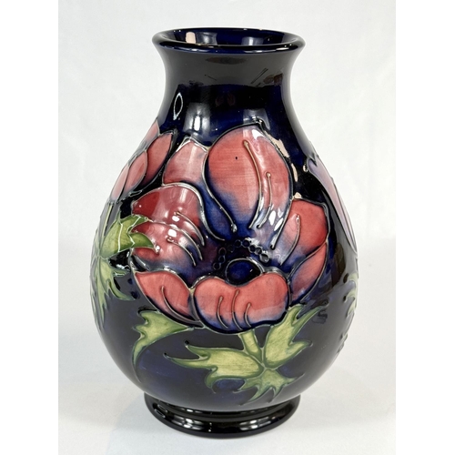 578 - A Moorcroft baluster blue ground vase in the Anemone pattern, height 19cm marks to base including c.... 