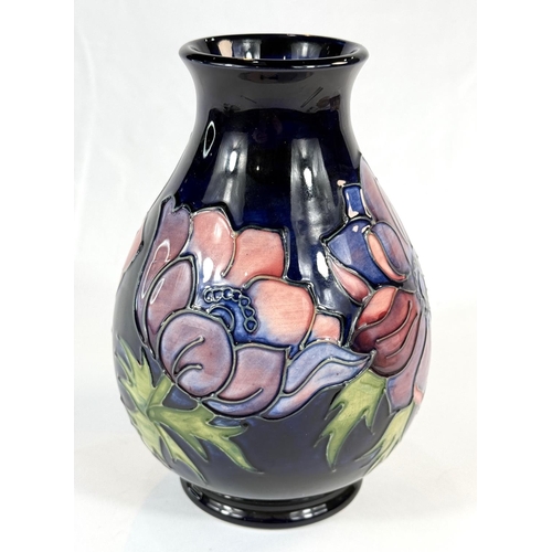 578 - A Moorcroft baluster blue ground vase in the Anemone pattern, height 19cm marks to base including c.... 