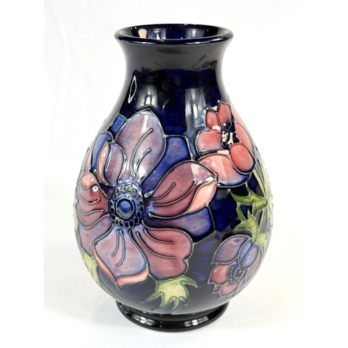 578 - A Moorcroft baluster blue ground vase in the Anemone pattern, height 19cm marks to base including c.... 