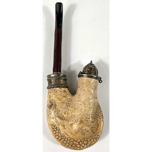 58 - A large Meerschaum pipe with silver lid and collar, cherrywood stem with extensive relief decoration... 