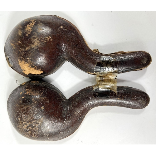 65 - A cased amber and Meerschaum pipe with chased silver mounts & a very realistic claw & egg bo... 