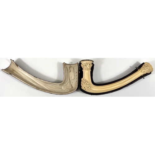 70 - An elongated Meerschaum pipe bowl with relief acanthus and shell decoration (no mouthpiece) length 2... 