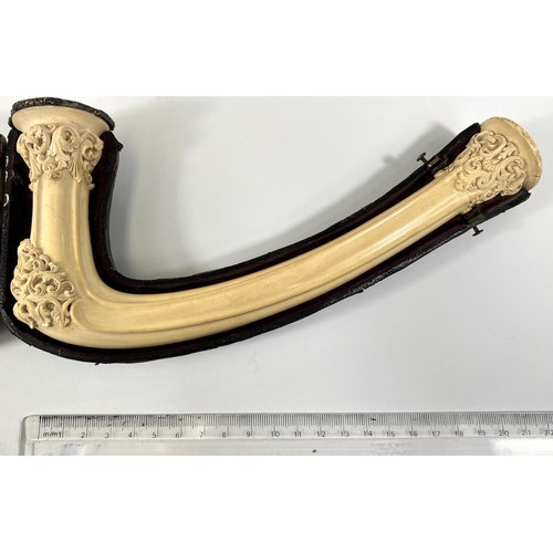 70 - An elongated Meerschaum pipe bowl with relief acanthus and shell decoration (no mouthpiece) length 2... 