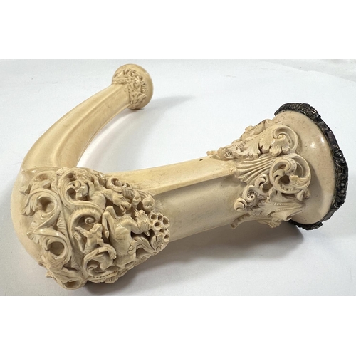 70 - An elongated Meerschaum pipe bowl with relief acanthus and shell decoration (no mouthpiece) length 2... 