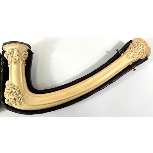 70 - An elongated Meerschaum pipe bowl with relief acanthus and shell decoration (no mouthpiece) length 2... 