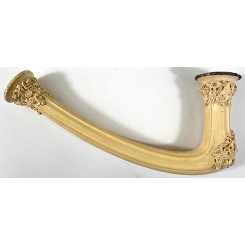 70 - An elongated Meerschaum pipe bowl with relief acanthus and shell decoration (no mouthpiece) length 2... 