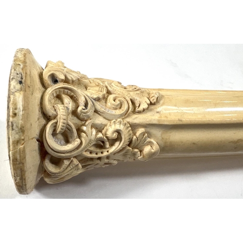 70 - An elongated Meerschaum pipe bowl with relief acanthus and shell decoration (no mouthpiece) length 2... 