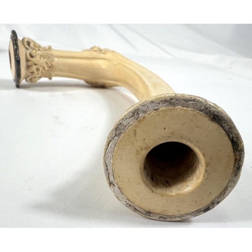 70 - An elongated Meerschaum pipe bowl with relief acanthus and shell decoration (no mouthpiece) length 2... 