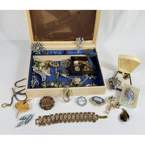 704 - A jewellery box and a large collection of costume jewellery.