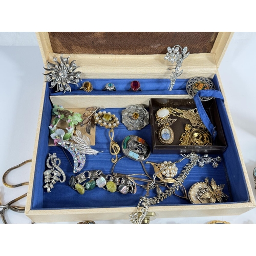 704 - A jewellery box and a large collection of costume jewellery.