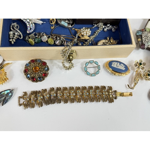 704 - A jewellery box and a large collection of costume jewellery.