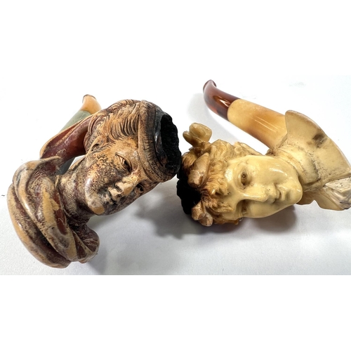 72 - 3 small amber and Meerschaum pipes, including a woman's head, cased; egg & claw, cased; and woma... 