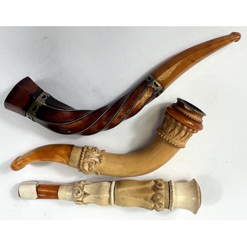 73 - 3 cased amber and Meerschaum cigar/cheroot holders.