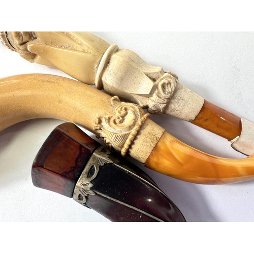 73 - 3 cased amber and Meerschaum cigar/cheroot holders.