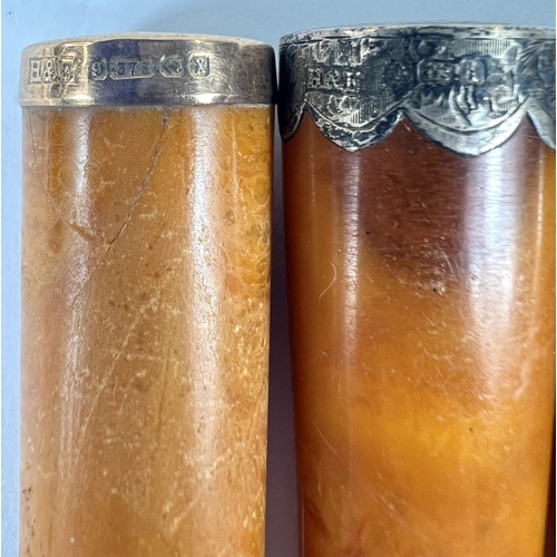 75 - 3 cased, gold mounted amber cigar holders & a similar holder, uncased.