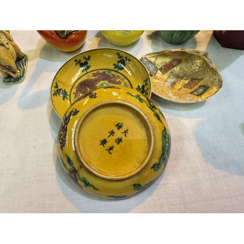 456B - A pair of Chinese yellow dishes decorated with dragons with six-character mark to bases, and a selec... 