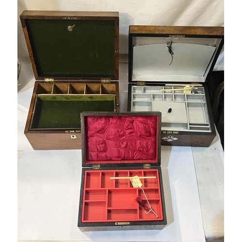 28 - Three 19th Century walnut jewellery boxes with inlaid decoration and fitted interiors.