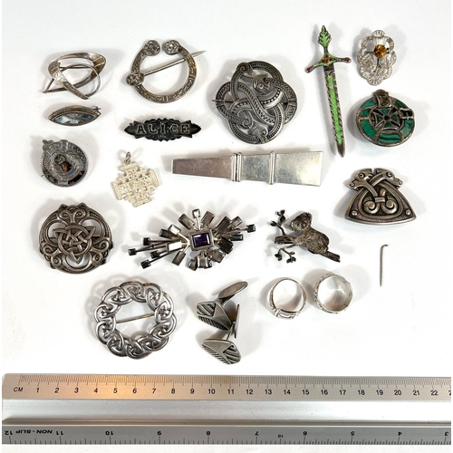 710 - A collection of silver Scandinavian and Celtic brooches etc