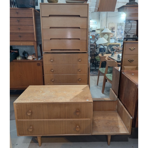 1007 - Two mid 20th century light wood chest of drawers and a similar dressing table.  Collection of b... 