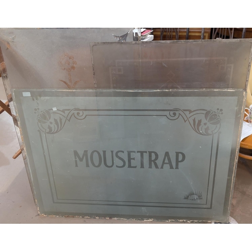 21 - A large early 20th century piece of acid etched glass panel with mousetrap in the centre, 78 x 112cm... 