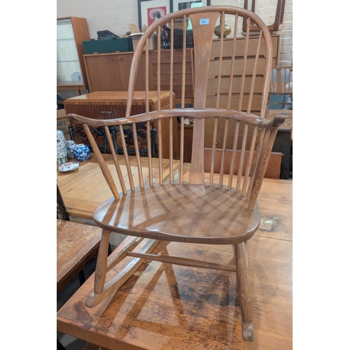 979 - An Ercol style hoop and stick back rocking chair