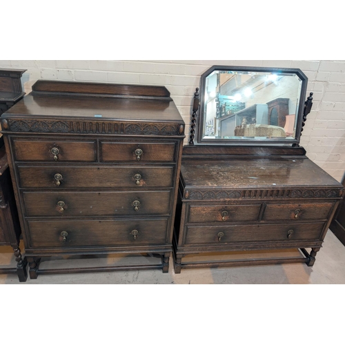 981 - A Jacobean style oak 2 piece bedroom suite - dressing table and chest of drawers