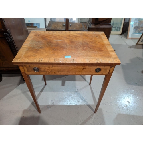 982 - A crossbanded mahogany occasional table with drawerNo bids sold with next lot