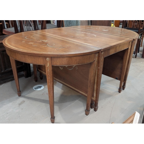 987 - A large late 19th/early 20th century mahogany Adams style painted dining table comprising two demi-l... 