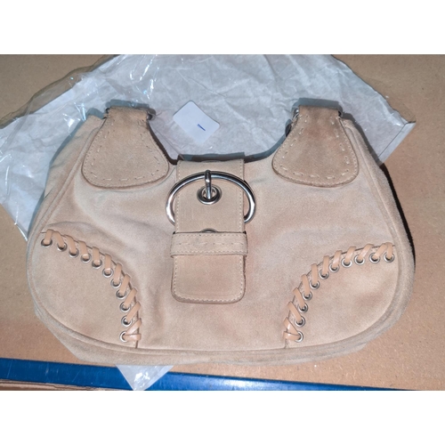 100A - Prada lady's suede handbag.